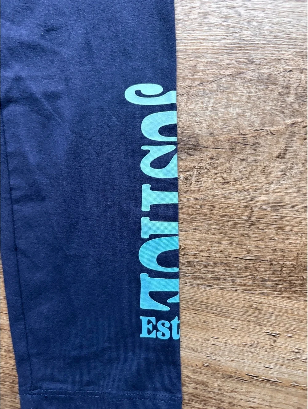 Justice Girls' Navy Blue Leggings Size L with Teal Logo Print